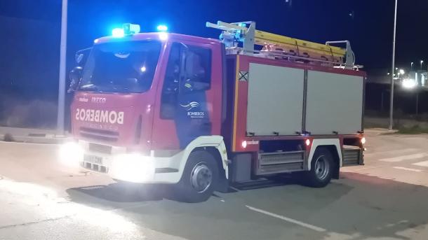 Camión de bomberos, de servicio durante una noche - Imagen de archivo