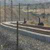 Plataforma con su vía colocada y electrificada a su paso por Cáceres.