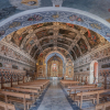 Las escenas representadas en sus muros y bóveda le han valido el título de 'Capilla Sixtina extremeña'