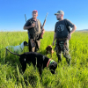 Cazadores junto a sus perros en Coria