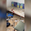 Imagen de habitación llena de basura