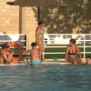 Bañistas en piscina