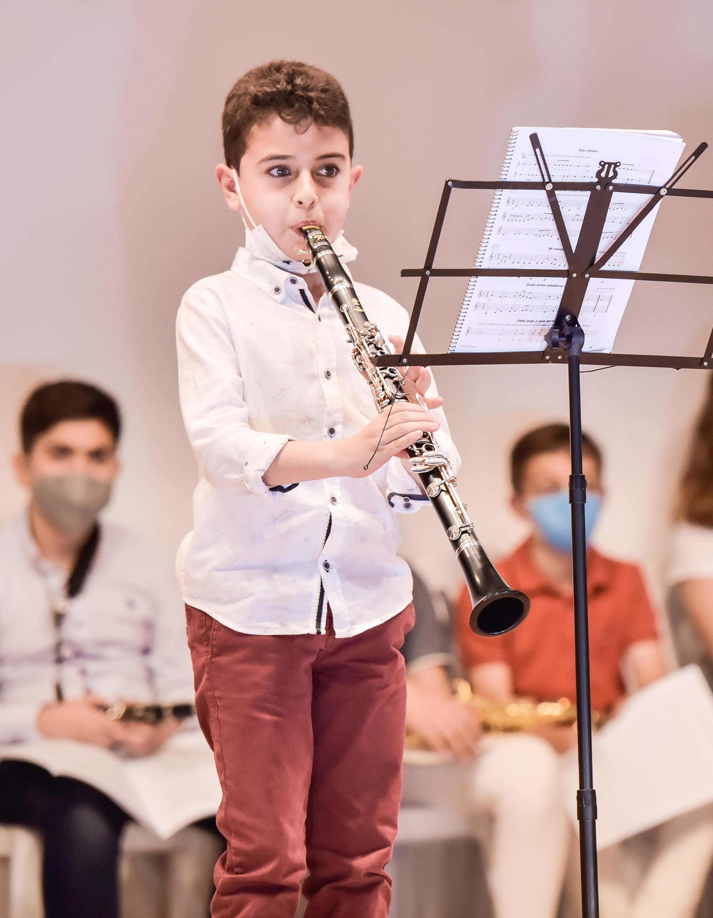 Niño tocando la trompeta en una audición de la Escuela Municipal de Música de Bienvenida