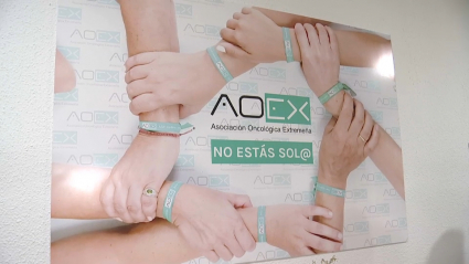 Cartel de la sede de AOEX 