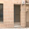 Apartamentos turísticos con la placa arrancada