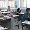 Un grupo de alumnos extremeños, con mascarilla, en clase