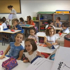 Niños y niñas en clase