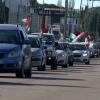 Vehículos recorriendo Mérida durante la Marcha a favor del Pueblo Saharaui